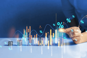 A professional in a suit holds an open palm over a laptop, displaying a glowing digital hologram of a handshake inside a futuristic circular interface.