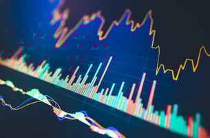 Male leader talking to his team about plans on a meeting in the office