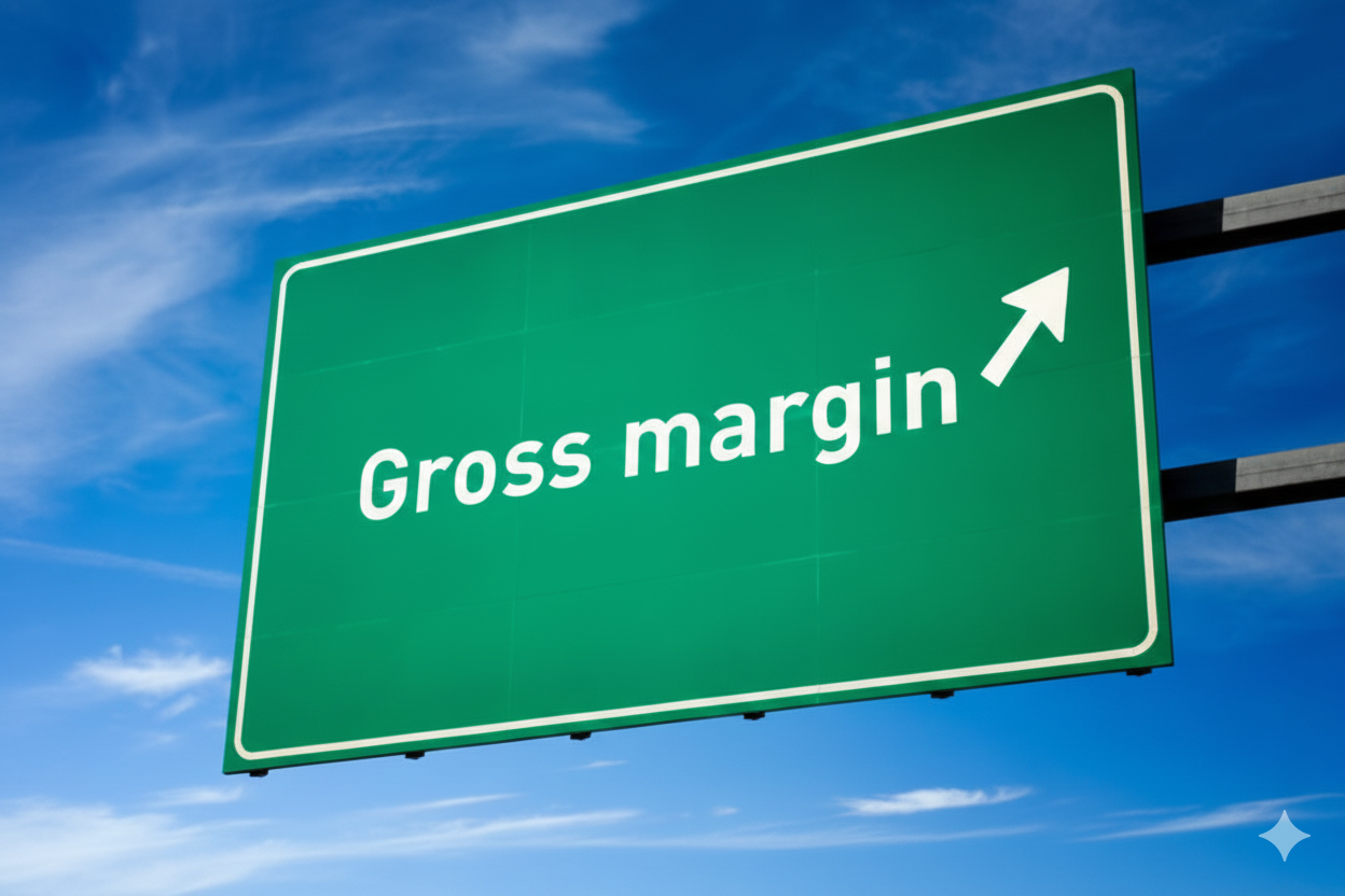 A young East Asian woman in a blazer stands outdoors at dusk, focused on using a stylus and tablet against a soft-focus city backdrop with glowing bokeh lights.